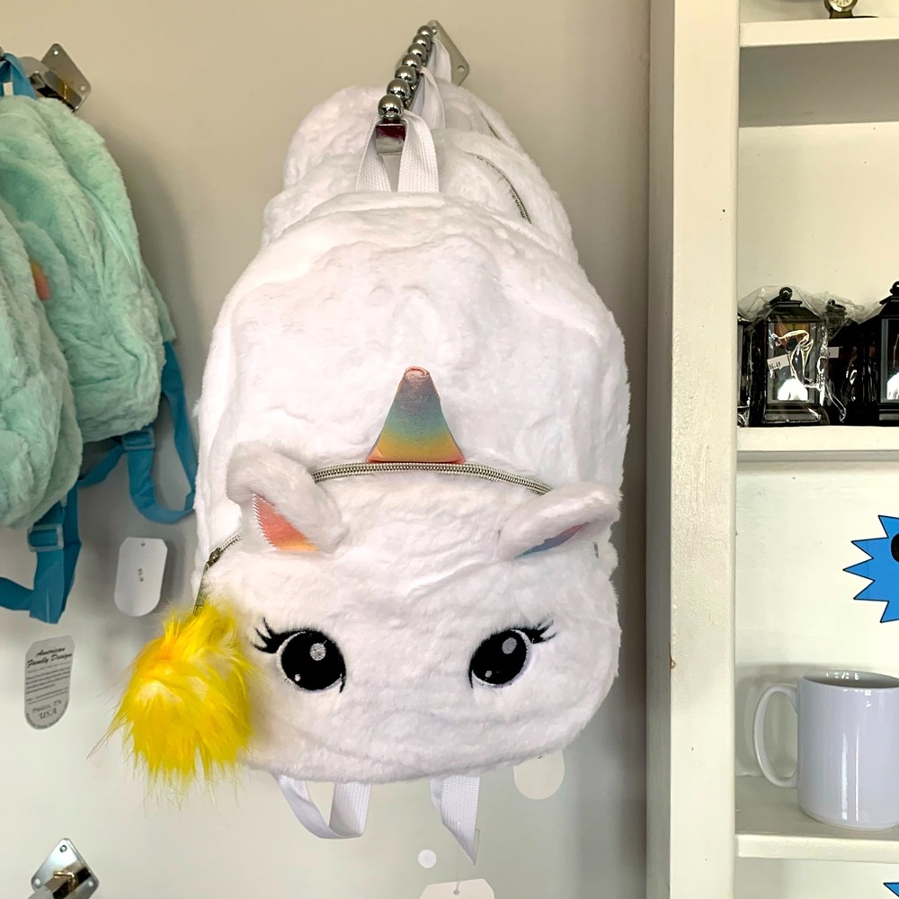 White Unicorn kids backpack super cute and soft. These are new w/tags.